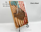 Wooden plaque with American flag design and Harley-Davidson logo on a white background